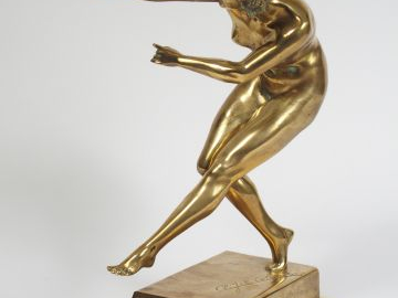 COLINET. Sculpture en bronze doré « Danseuse ». Socle en onyx. H. : 33