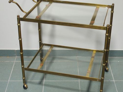 ADNET (attribué à). Table roulante en verre et métal.