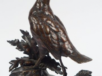 Vente aux enchères MOIGNIEZ. 'La perdrix'. Sculpture en bronze à patine brune. Signée H. 
