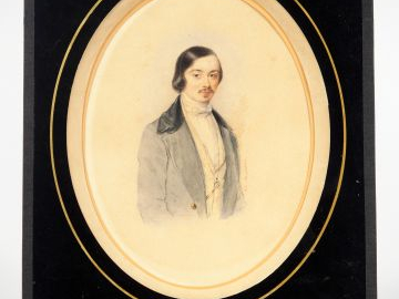 En. DELATOUR. Aquarelle en médaillon signée en bas à droite "Portrait 