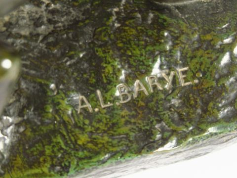 Antoine Louis BARYE. 'Tigre dévorant un lièvre'. Sujet en bronze à pat