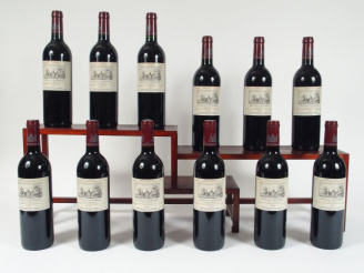 Vente aux enchères 12 BOUTEILLES CHÂTEAU CANTEMERLE GCC HAUT MEDOC - 2000 - CBO
