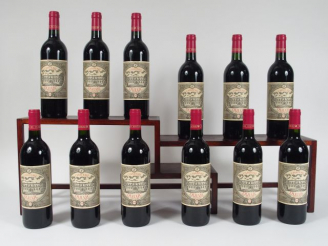 Vente aux enchères 12 BOUTEILLES CHÂTEAU DULUC ST JULIEN - 2000 - CBO