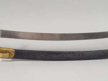 Sabre briquet modèle 1767. Monture en bronze fondu, calotte en casque 