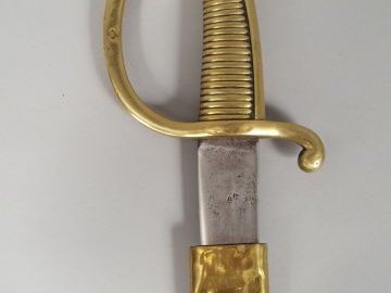 Sabre briquet modèle AN XI, fusée en bronze coulé à 28 torons, signée 