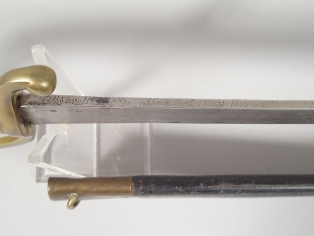 Sabre briquet modèle AN XI, fusée en bronze coulé à 28 torons, quillon