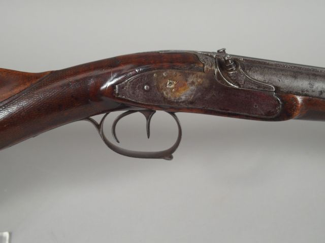 Fusil double à percussion platine à l’avant, crosse bec de canard, man