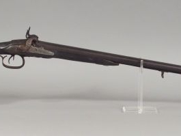 Fusil à percussion de chasse double anciennement à silex transformé à 