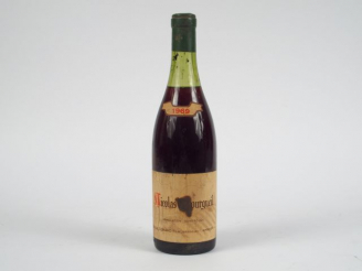 Vente aux enchères 1 BOUTEILLE ST NICOLAS BOURGUEIL M. DUHARD - 1969 - 4 CM/ET