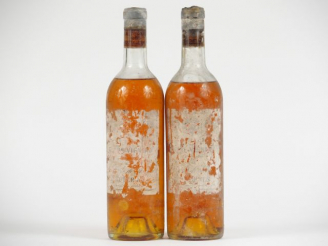 Vente aux enchères 2 BOUTEILLES CHÂTEAU RAYNE VIGNEAU 1er CC SAUTERNES - 1955 - 1 HEP-MEP