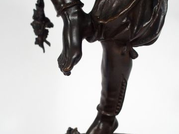 LEBOURG "Le joueur de Biniou". Sculpture en bronze à patine brune. Sig