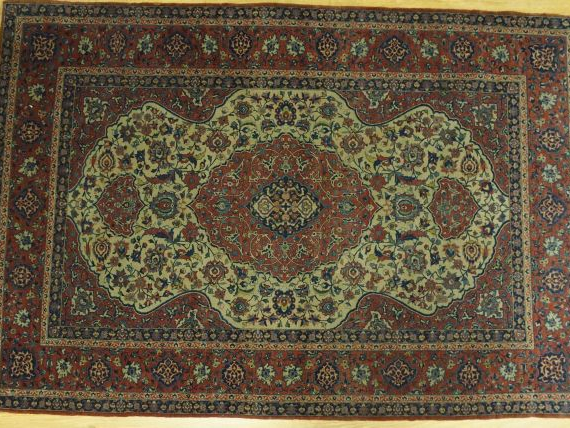 Tapis Ispahan, fond beige médaillon central. 2,20 x 1,49 m
