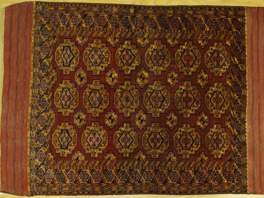 Tapis Boukhara, fond rouge semis de gül. 1,80 x 1,22 m