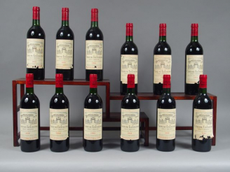 Vente aux enchères 12 BOUTEILLES CHÂTEAU LA LAGUNE GCC HAUT MEDOC - 1986 - CBO - 8 EA/8 B
