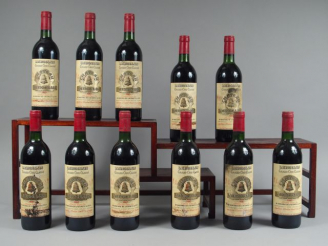 Vente aux enchères 11 BOUTEILLES CHÂTEAU L'ANGELUS 1er GCC ST EMILION - 1987 - CBO - 5 BG