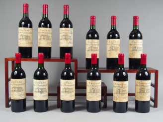 Vente aux enchères 12 BOUTEILLES CHÂTEAU HAUT MARBUZET CBE ST ESTEPHE - 1991 - 1 BG/ET