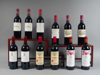 Vente aux enchères CAISSE PANACHEE 1995 : 2 PETRUS POMEROL 1 ELA EN BORDURE - 2 CHÂTEAU M
