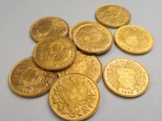 Vente aux enchères 10 pièces de 20 francs Suisse or, 1935 B. Frais acheteurs : 5 % TTC