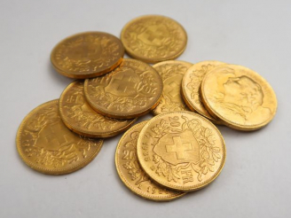 Vente aux enchères 10 pièces de 20 francs Suisse or, 1935 B. Frais acheteurs : 5 % TTC