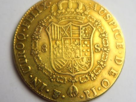 Pièce de 8 escudos en or. Poids : 27 g. Diam. : 36 mm