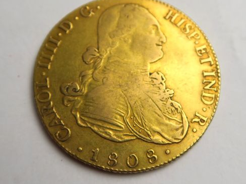 Pièce de 8 escudos en or. Poids : 27 g. Diam. : 36 mm