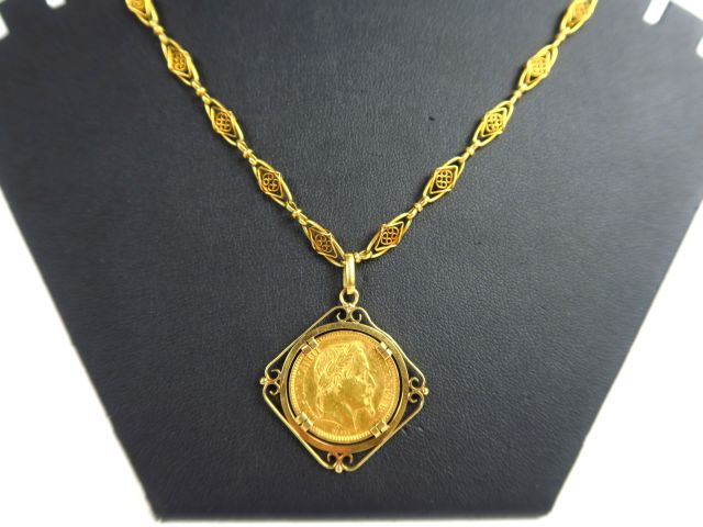 1 pièce de 20 francs or 1864 B, montée en pendentif, avec sa giletière