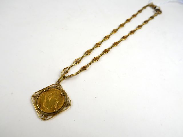 1 pièce de 20 francs or 1864 B, montée en pendentif, avec sa giletière