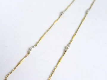 Chaine en or, alternance de perles. Poids : 3,33 g