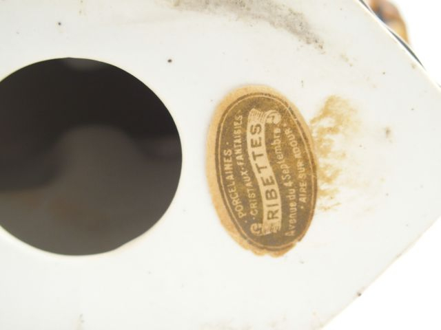 THARAUD. Paire de serre-livres Art Déco en porcelaine polychrome de Li