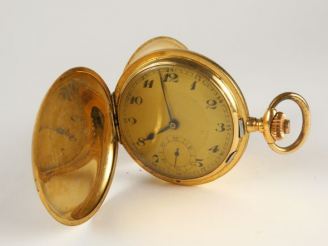 Vente aux enchères Montre de gousset en or 14 carats. Poids tel : 78 g