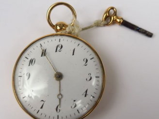 Vente aux enchères Montre de gousset en or 14 carats, avec sa clé. Poids tel : 58 g