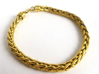 Vente aux enchères Bracelet maille épi en or. Poids : 14,5 g