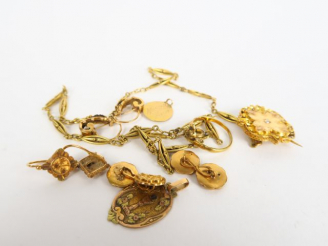 Vente aux enchères Lot de débris de bijoux en or. Poids : 20,8 g