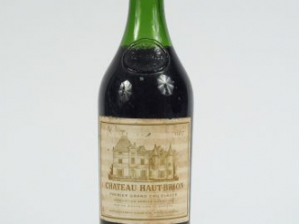 Vente aux enchères 1 BOUTEILLE CHÂTEAU HAUT BRION 1er GCC GRAVES - 1967 - 4,5 CM/ EF/CAPS