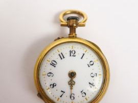 Vente aux enchères Petite montre de col 1900 en or.  Poids tel : 15 g  (manque le verre)