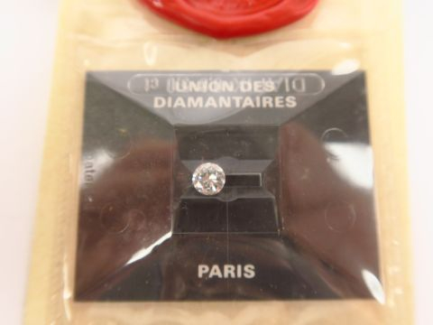 Brillant sur papier de 0,47 cts, couleur G, avec certificat authentici