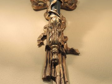 Suite de quatre appliques doubles de style Louis XVI en bronze doré, à