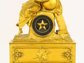 Vente aux enchères Pendule Restauration en bronze doré, à décor d'une allégorie de la géo