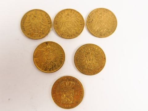 5 pièces de 20 Marks or et une pièce de 10 guinées or
