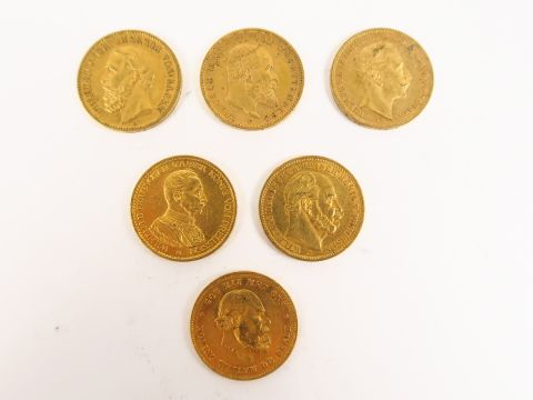 5 pièces de 20 Marks or et une pièce de 10 guinées or