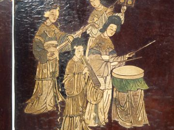 Paravent à quatre feuilles en laque de Coromandel, décor finement grav