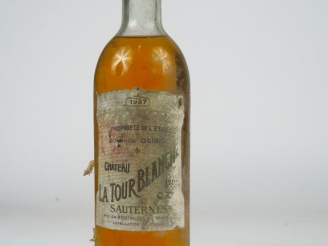 Vente aux enchères 1 BOUTEILLE CHÂTEAU LA TOUR BLANCHE 1er CC SAUTERNES - 1957 - HEP/EA/B
