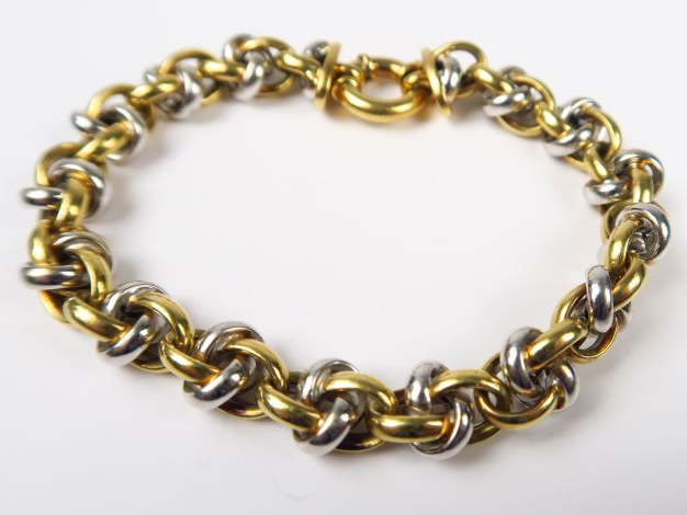 Bracelet à maillons en or jaune et or blanc. Poids : 16,7 g
