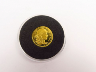 Vente aux enchères Réduction de pièce de 20 frcs en or. Poids : 1,2 g