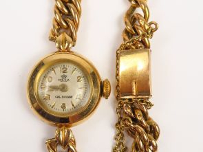 Vente aux enchères Montre de dame, bracelet et cadran en or. Poids tel : 13,9 g