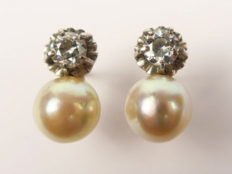 Vente aux enchères Paire de boucles d'oreilles ornées de diamants taille ancienne de 0,48