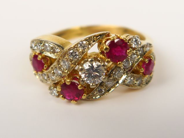 Bague sertie d'un brillant de 0,16 carats environ et de quatre rubis, 