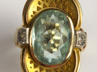  Bague en or ornée d'une aigue marine. Poids tel : 6,68 g tel