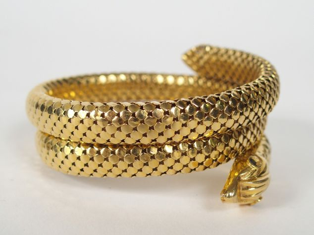 Bracelet serpent en or jaune (manque les 2 pierres marquant les yeux d