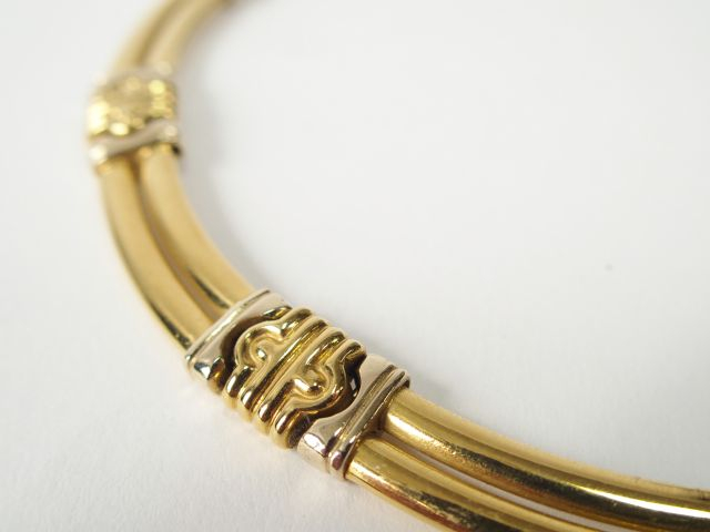 Collier articulé en or jaune et gris. 45 cm. Poids: 60gr